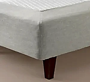 The bed cover Base cover on a DUX bed with tapered legs